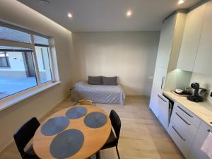 Kuchyň nebo kuchyňský kout v ubytování Monte Urbo apartments