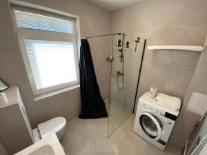 Koupelna v ubytování Monte Urbo apartments