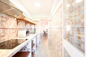 Kuchnia lub aneks kuchenny w obiekcie Belgica 2 - 2 room city & beach by 10ToSea