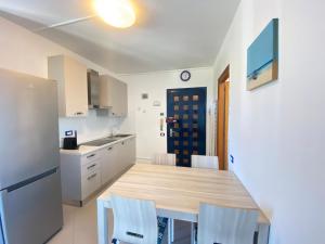 Kuchyň nebo kuchyňský kout v ubytování Venere Apartament