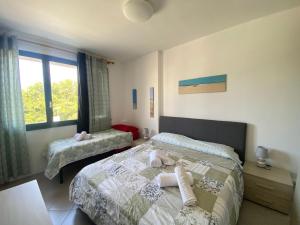Postel nebo postele na pokoji v ubytování Venere Apartament