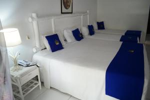 Cama ou camas em um quarto em Hotel Solar do Imperador