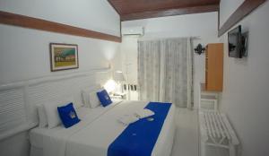 Cama ou camas em um quarto em Hotel Solar do Imperador
