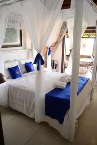 Cama ou camas em um quarto em Hotel Solar do Imperador