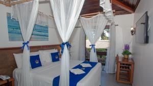 Cama ou camas em um quarto em Hotel Solar do Imperador