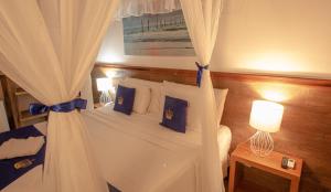Cama ou camas em um quarto em Hotel Solar do Imperador