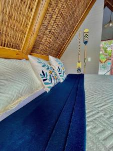 Pousada Villa di Luna客房内的一张或多张床位