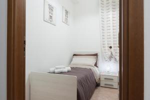 Кровать или кровати в номере Nina Home - Selfcheck-in
