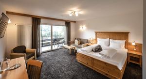 Postel nebo postele na pokoji v ubytování Hotel Schmung