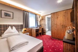 Postel nebo postele na pokoji v ubytování Hotel Schmung