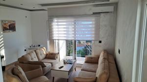 Posezení v ubytování De Lux Apartments Smolovic