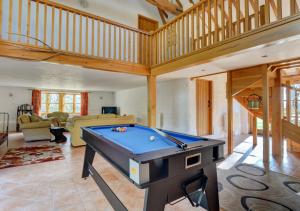 a living room with a pool table in it at Rectory Barn in Ashwellthorpe