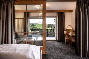 Postel nebo postele na pokoji v ubytování Hotel Schmung