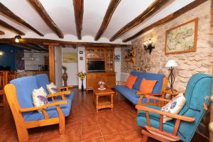 Μια τηλεόραση ή/και κέντρο ψυχαγωγίας στο Casas rurales LA LAGUNA y LA BUHARDILLA DE LA LAGU
