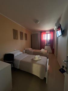 Postel nebo postele na pokoji v ubytování B&B Marco Polo