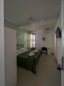 Postel nebo postele na pokoji v ubytování B&B Marco Polo