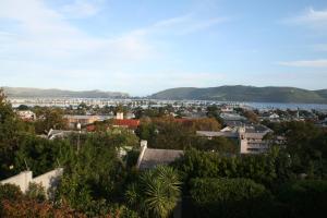 a view of a city with a body of water at Fijnbos Guesthouse in Knysna