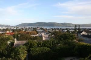 a city with a view of the water and buildings at Fijnbos Guesthouse in Knysna