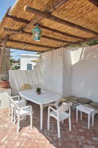 A patio or other outdoor area at La Terrazza sul blu di Capri