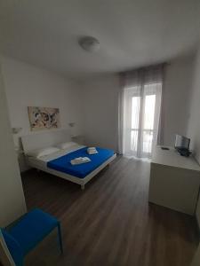 Postel nebo postele na pokoji v ubytování La Llua Alghero
