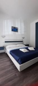 Postel nebo postele na pokoji v ubytování La Llua Alghero
