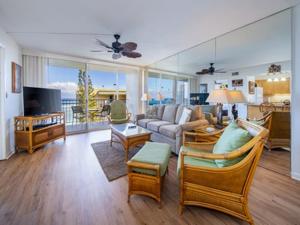 a living room with a couch and a table at Royal Kahana Maui by OUTRIGGER in Lahaina