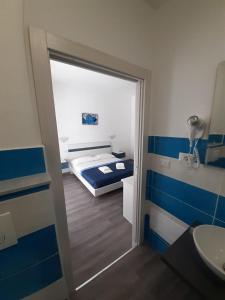 Postel nebo postele na pokoji v ubytování La Llua Alghero