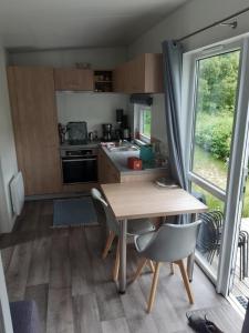 Kuchyň nebo kuchyňský kout v ubytování Tinyhouse Wemding