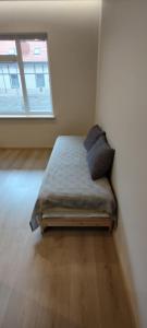 Postel nebo postele na pokoji v ubytování Monte Urbo apartments