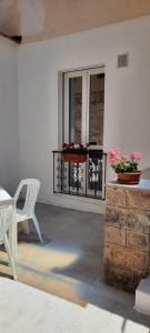 Balkón nebo terasa v ubytování La Llua Alghero