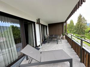 Balkón nebo terasa v ubytování Apartment Deluxe Ossiacher See - Gerlitzen