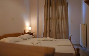Katil atau katil-katil dalam bilik di Nikos Apartments A8