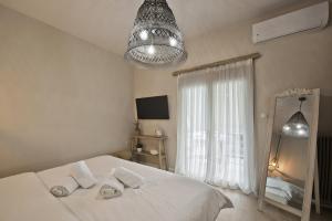 Posteľ alebo postele v izbe v ubytovaní Stylish Apartment at Pagrati