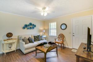 a living room with a couch and a table at Mississippi Vacation Rental Less Than 1 Mi to Ole Miss in Oxford