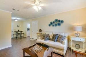 a living room with a couch and a table at Mississippi Vacation Rental Less Than 1 Mi to Ole Miss in Oxford