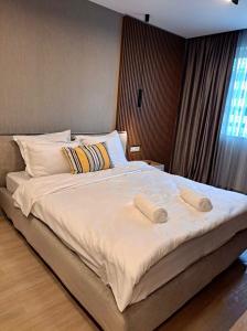 Ένα ή περισσότερα κρεβάτια σε δωμάτιο στο JAD - Luxury - 3 Room Apartments - Urban Plaza