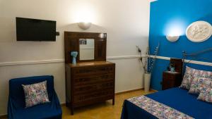 TV a/nebo společenská místnost v ubytování Olimpo Room