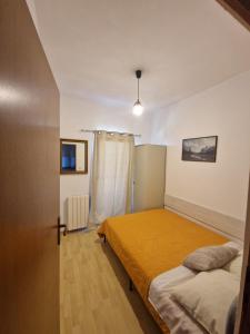 Postel nebo postele na pokoji v ubytování Apartmani Tereza