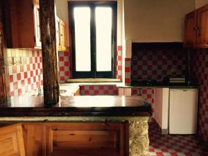 Kitchen o kitchenette sa Villa Mara