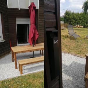 a picnic table with a red umbrella and a chair at Maison spacieuse 8 pers 4 ch A31 EV in Rolampont