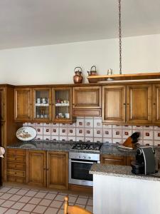 Kuchyň nebo kuchyňský kout v ubytování Casa Vanni