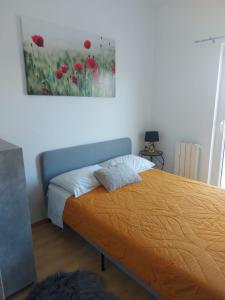 Postel nebo postele na pokoji v ubytování Apartmani Tereza