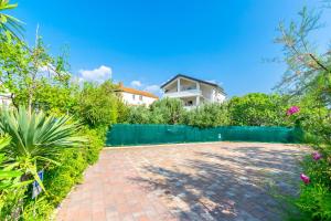 Vonkajšia záhrada v ubytovaní Apartments Ivan M