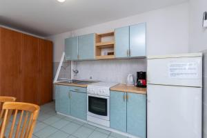 Kuchyňa alebo kuchynka v ubytovaní Apartments Ivan M