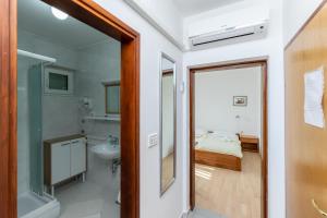 Kúpeľňa v ubytovaní Apartments Ivan M + 37 fotografií