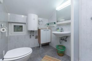 Kúpeľňa v ubytovaní Apartments Ivan M