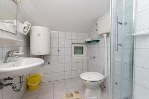 Kúpeľňa v ubytovaní Apartments Ivan M