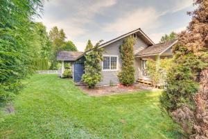 a house with a yard in front of it at Issaquah Retreat Near Lake Sammamish State Park! in Issaquah
