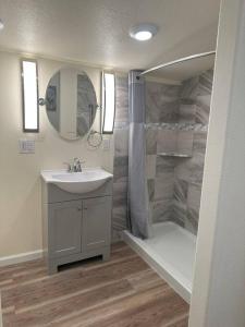 a bathroom with a sink and a shower at NEW Private House A with Carports EV Plugin L2 in Twin Falls