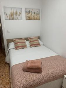 Postel nebo postele na pokoji v ubytování Apartamentos custodio